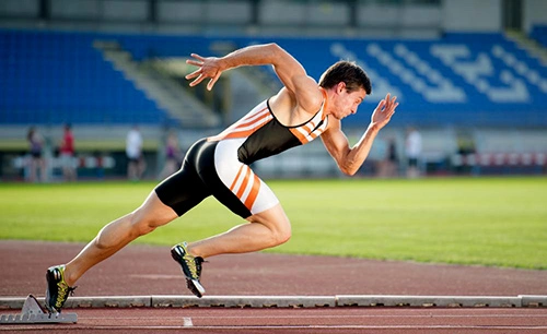 athlete-takes-off-running.webp