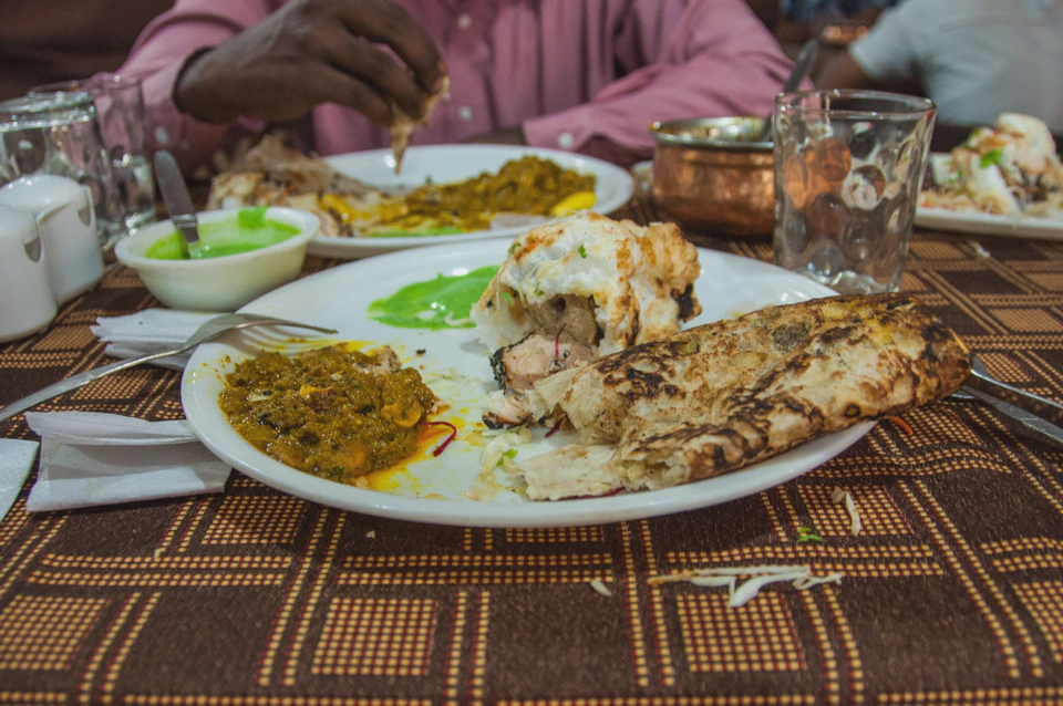  Having delicious kebab with Amit at a restaurant.