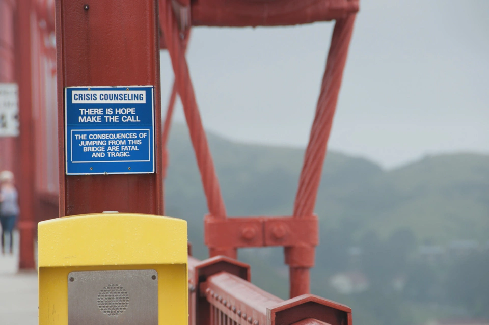 suicide-help-phone-at-golden-gate-bridge.webp